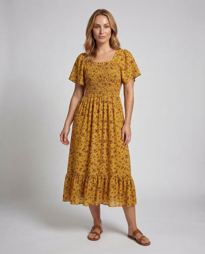 Damen Sommerkleid mit Smokoberteil Puffärmel Volantrock