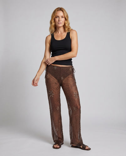 Damen Elegante transparente weit geschnittene Hose mit verzierten Details EB
