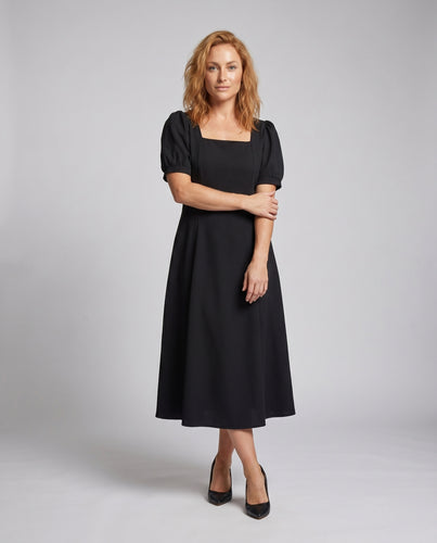 Damen Midi-Kleid mit schmeichelndem Schnitt und eleganten Puffärmeln