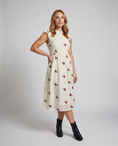 Damen Rüschenkleid mit floralem Stickdesign und schicker Knopfleiste