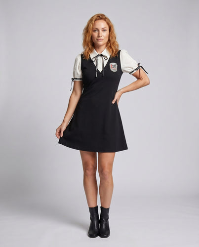 Damen Kleid im klassischen Stil mit Pünktchenmuster und eleganter Schleife
