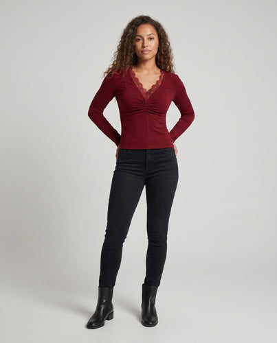 Damen elegantes Oberteil mit Spitzenakzenten und Wickeldesign