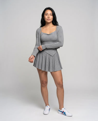Damen elegantes Oberteil mit langem Arm und verspieltem Rock