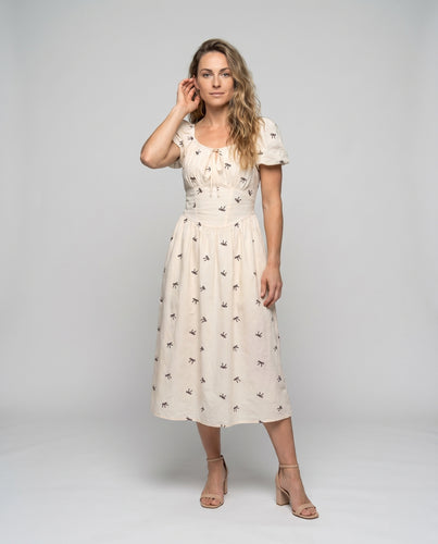 Damen Freizeitkleid mit verspieltem Schleifenmuster und elegantem Rundhalsausschnitt