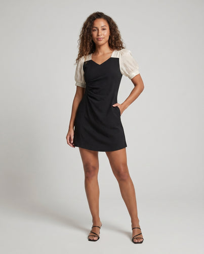 Damen Kleid mit eleganten Puffärmeln und tailliertem Schnitt