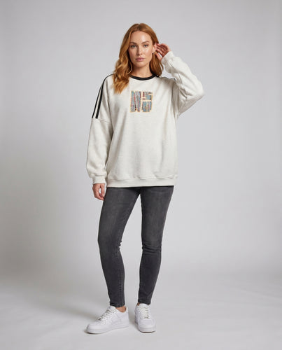Damen nan weites komfortables Sweatshirt mit Raglanärmeln, seitlichen Sportstreifen und texturiertem Logo-Patch EB