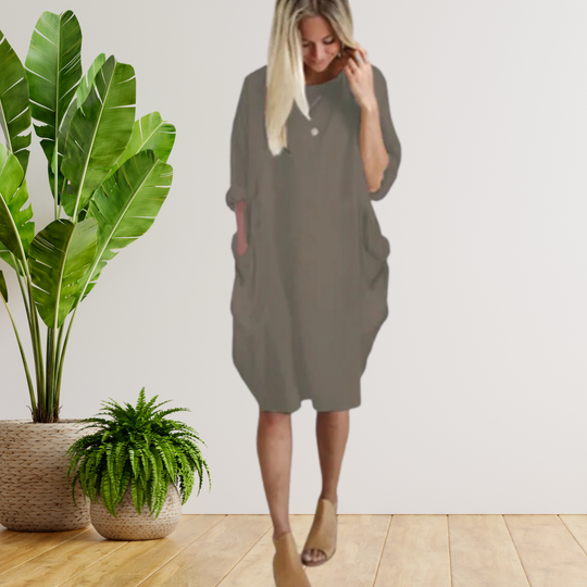 Langärmeliges lockeres Taschenkleid