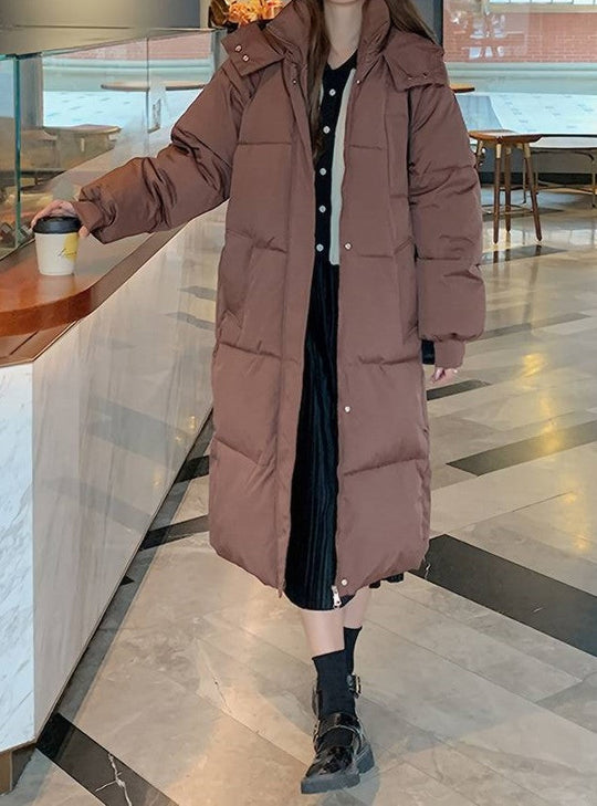 EB | Lange Pufferjacke - Wasserabweisend - Gestepptes Design - Kapuze - Warm und Bequem