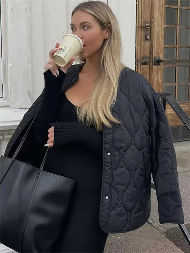 EB | Oversized Gesteppte Jacke mit Druckknöpfen