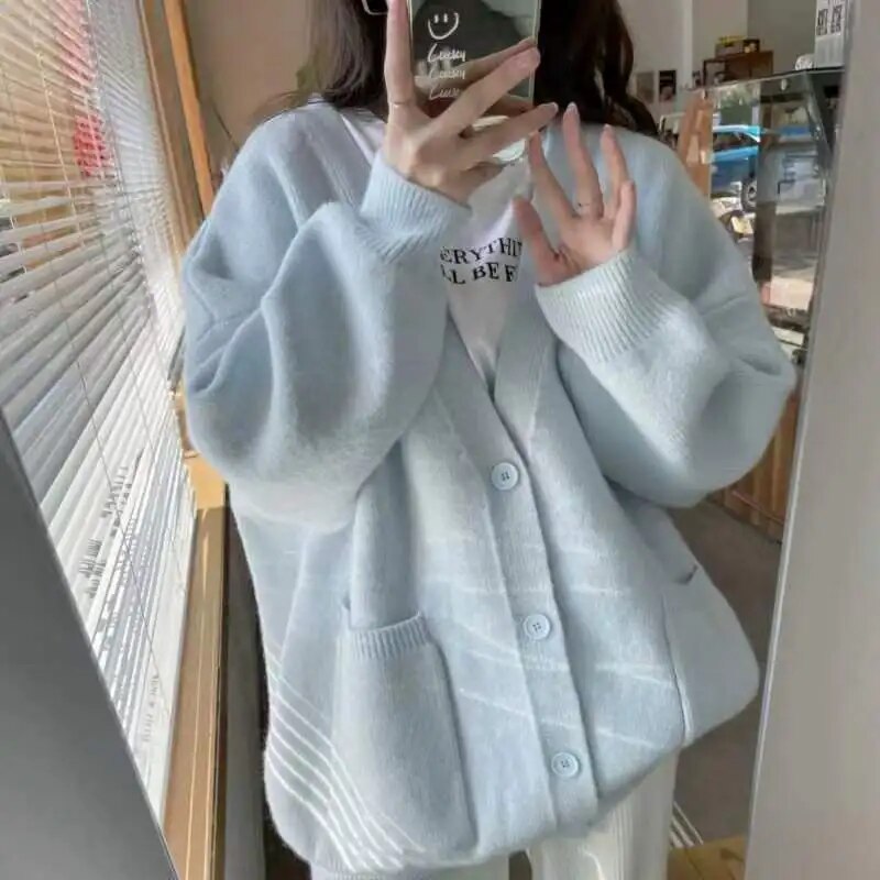 EB | Elegante Strickjacke mit Knopfleiste