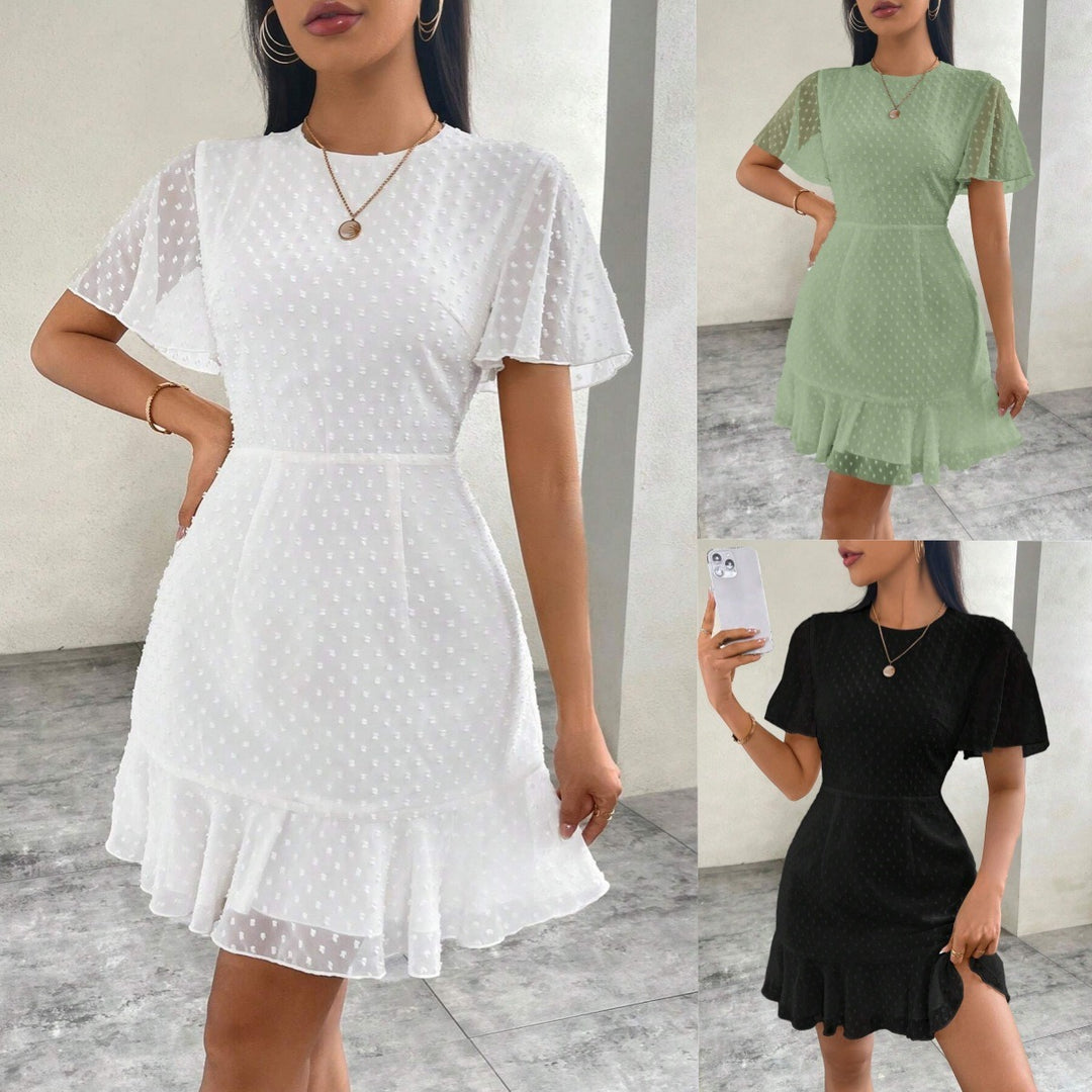 EB | Dreidimensionales Kleid mit Rüschenrand und Punkten