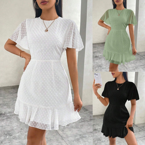 EB | Dreidimensionales Kleid mit Rüschenrand und Punkten