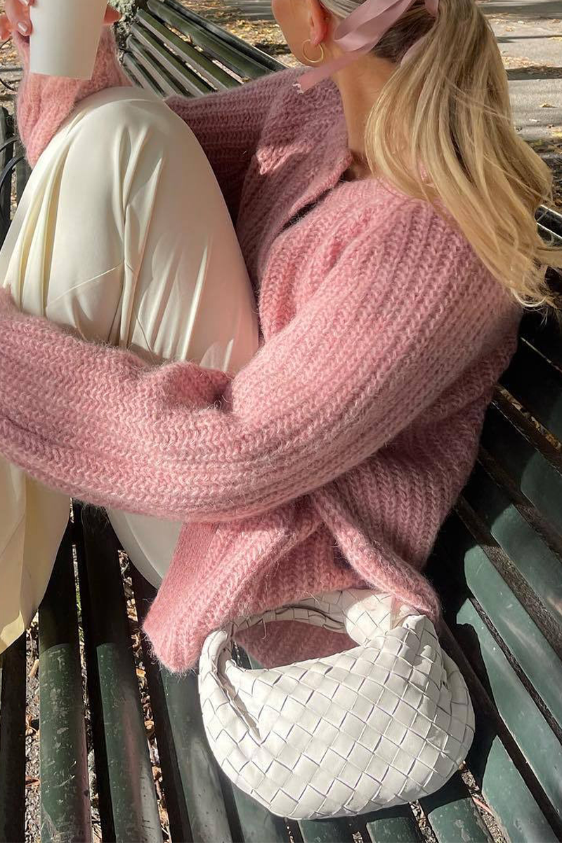 EB | Lässiger Strickpullover mit Knöpfen und Rundhalsausschnitt. Oberbekleidung