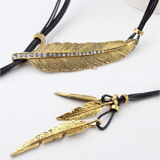 EB | Goldene Feder Halskette Im Boho Stil