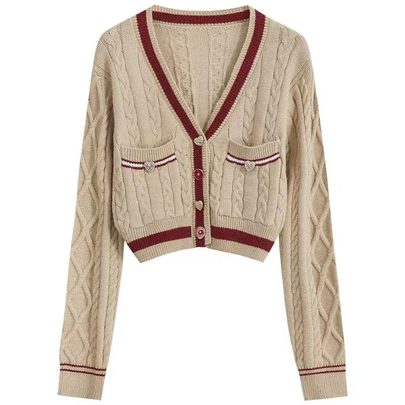 EB | Kurze Strickjacke Elegant und Modern Kontrastdetails