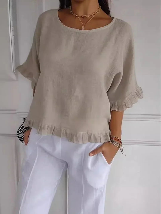 Feminine Rüschenbluse aus hochwertigem Stoff