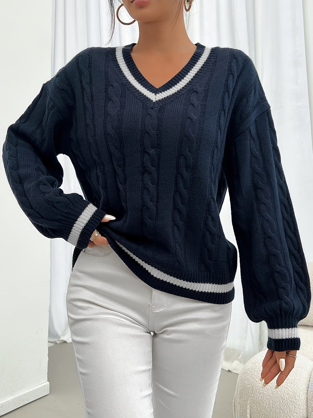 EB | Kabelstrickpullover mit Zarten Details