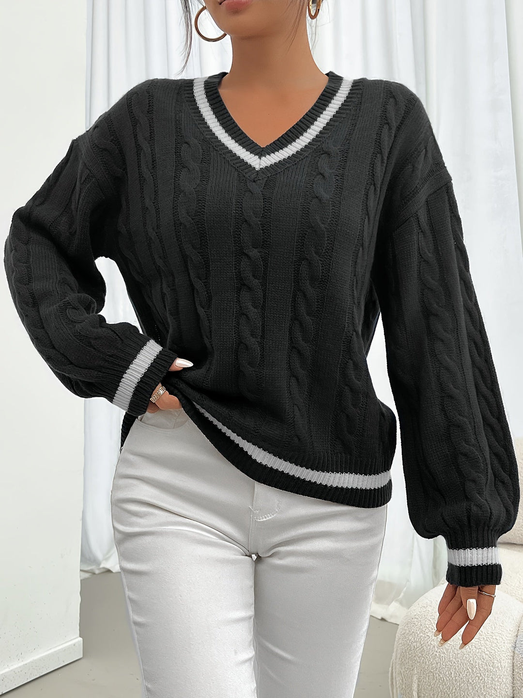 EB | Kabelstrickpullover mit Zarten Details