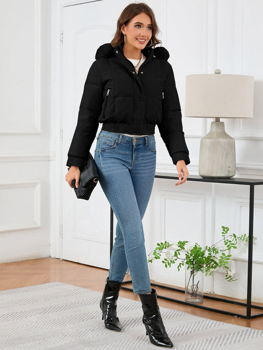 EB | wattierte Winterjacke mit Fellkapuze und Taschen