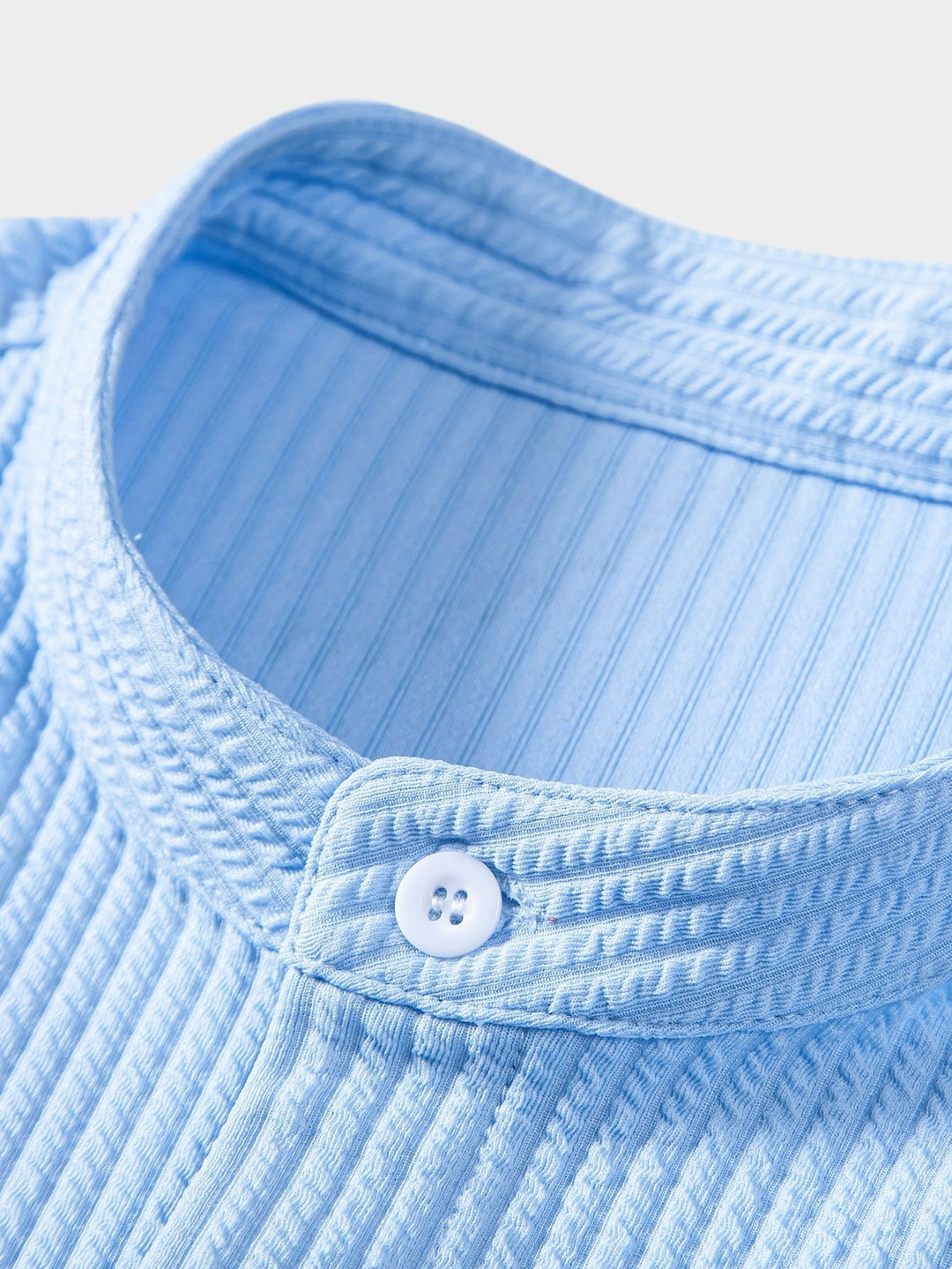 EB | Gerippte Stehkragenbluse