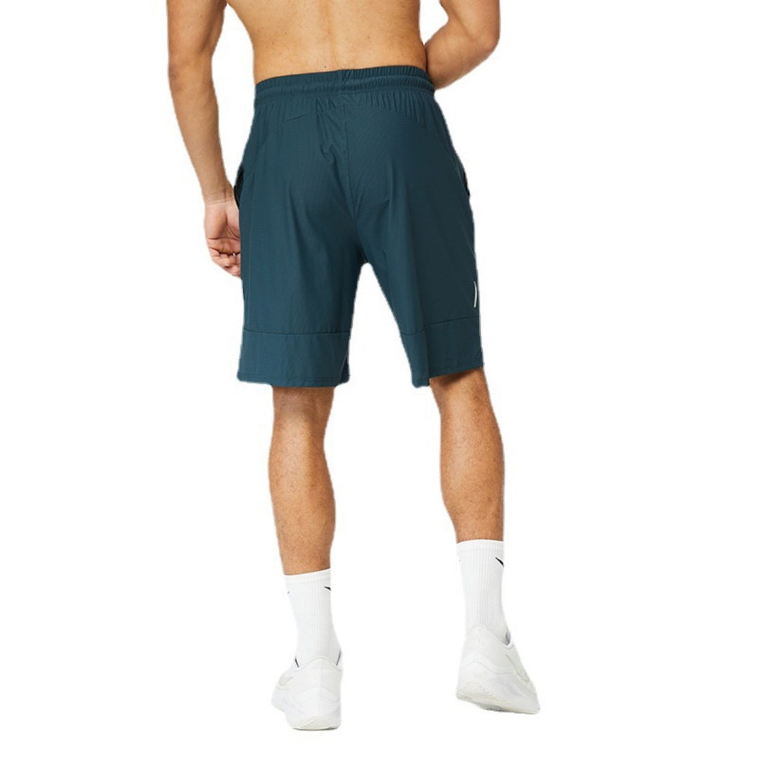 EB | Schnelltrocknende Sportshorts mit reflektierendem Streifen