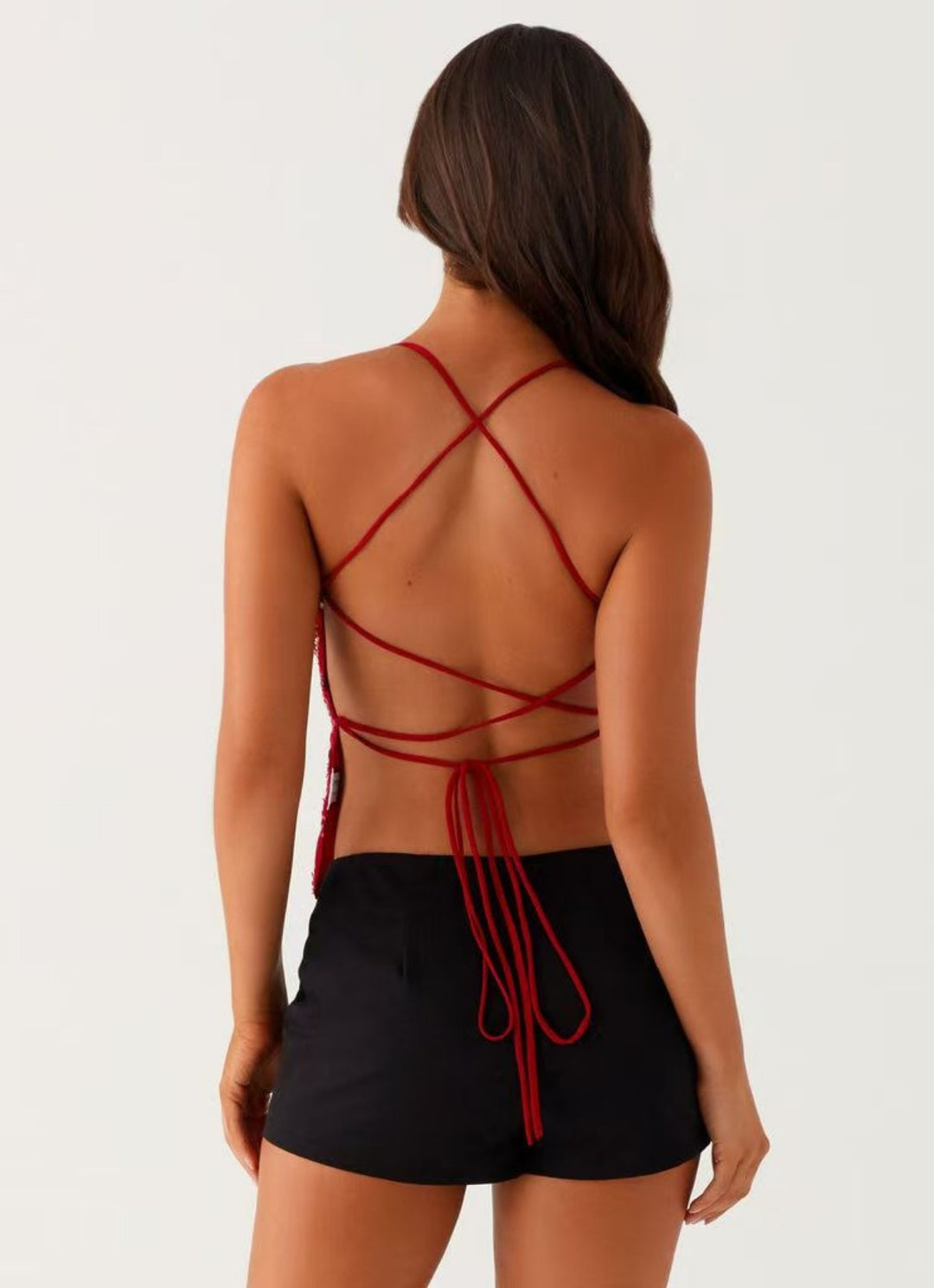 EB | Bestickte Weste Sling
