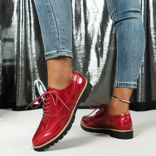 Glänzende Lederschuhe EB