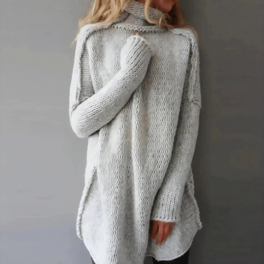 EB | Handgestrickter Kabelpullover