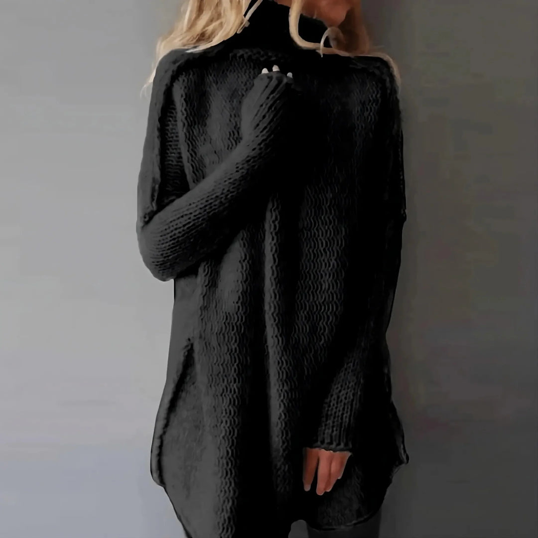 EB | Handgestrickter Kabelpullover