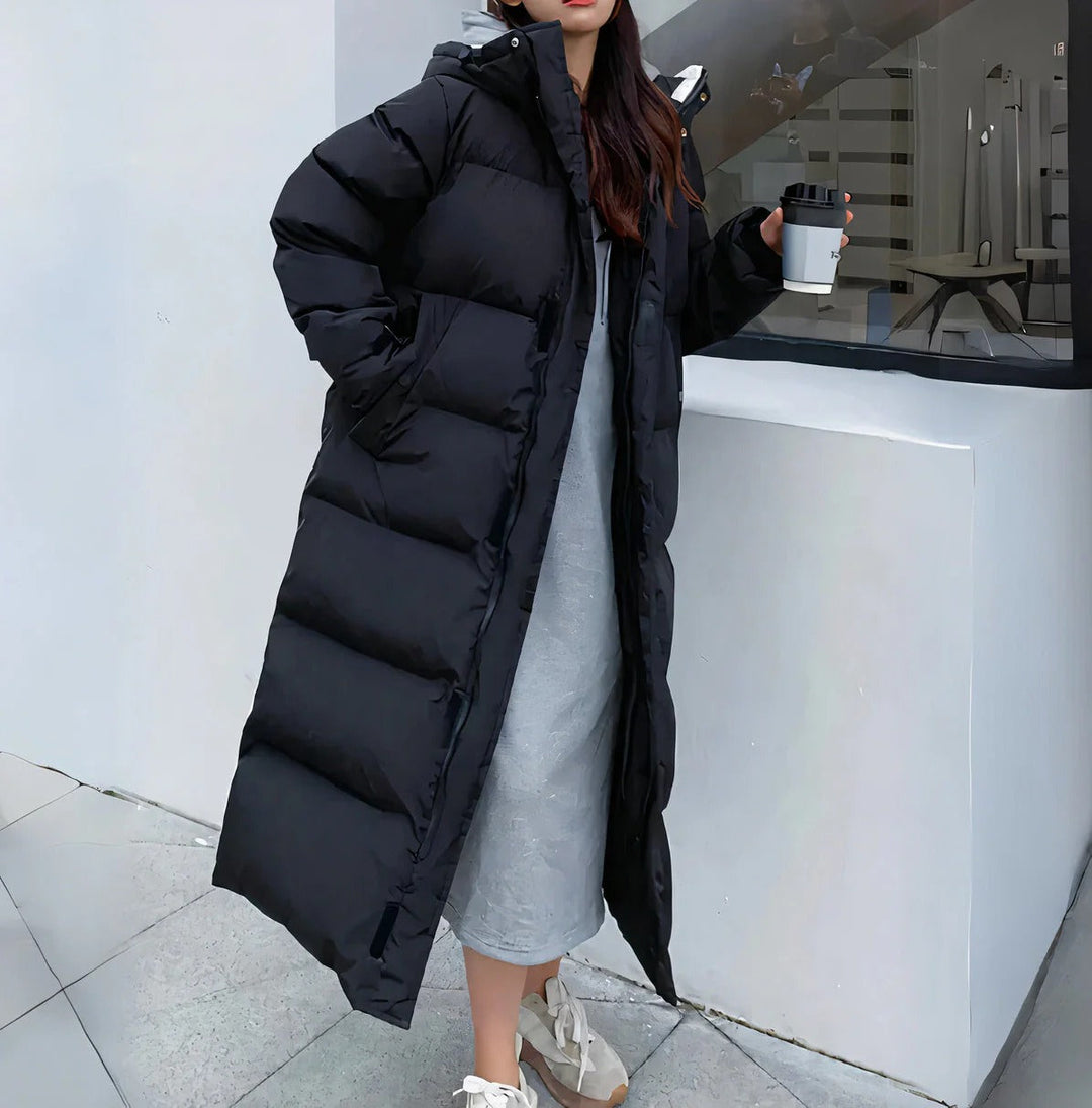 EB | Lange Stepp Pufferjacke mit Kapuze für Wintertage