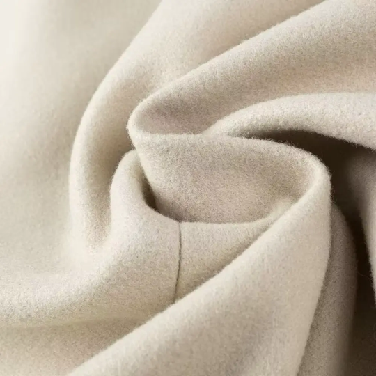 EB | Quasten Blends Mantel