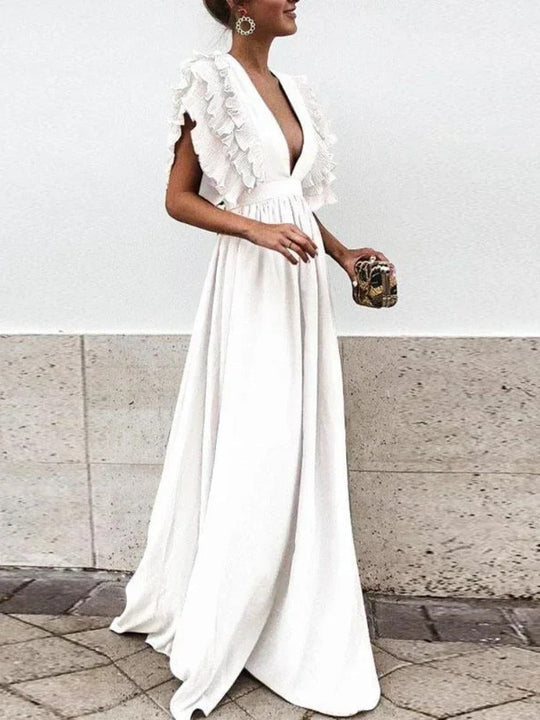 EB | Elegantes Kleid mit V-Ausschnitt und Rüschensäumen