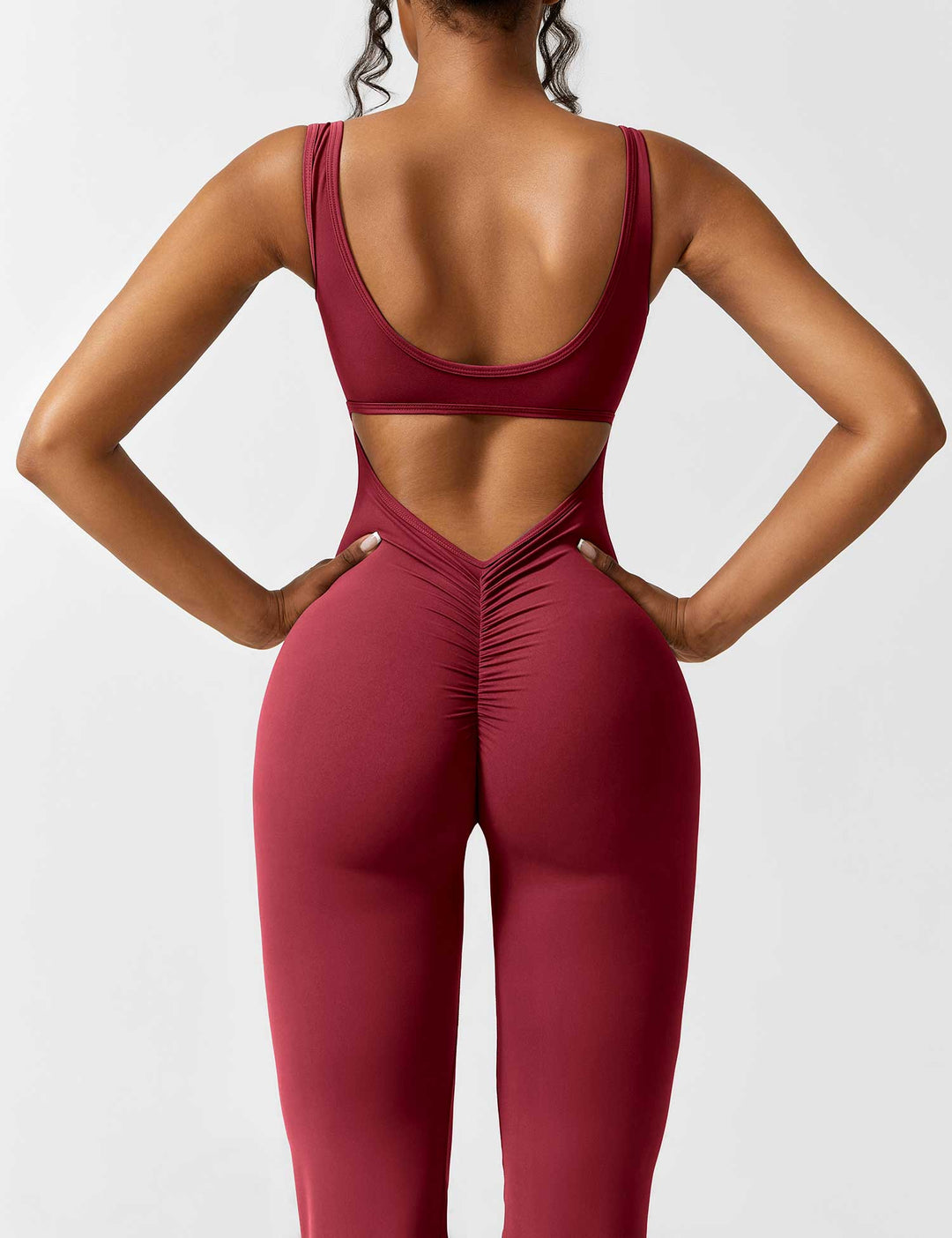 EB | V-Rücken Auslaufender Jumpsuit