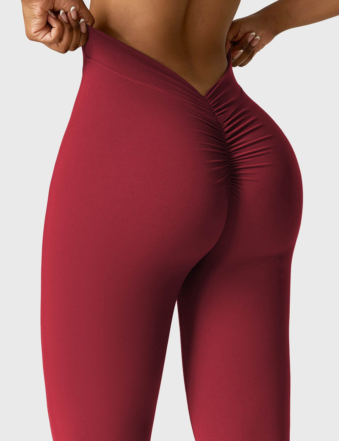 EB | Ausgestellte Leggings mit V-Ausschnitt